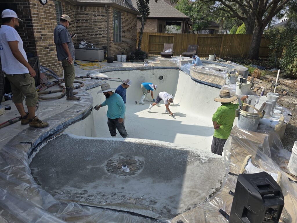 Aqua Cove Pools | Pool Remodel: Plaster, New Water Feature, Water Line Tile